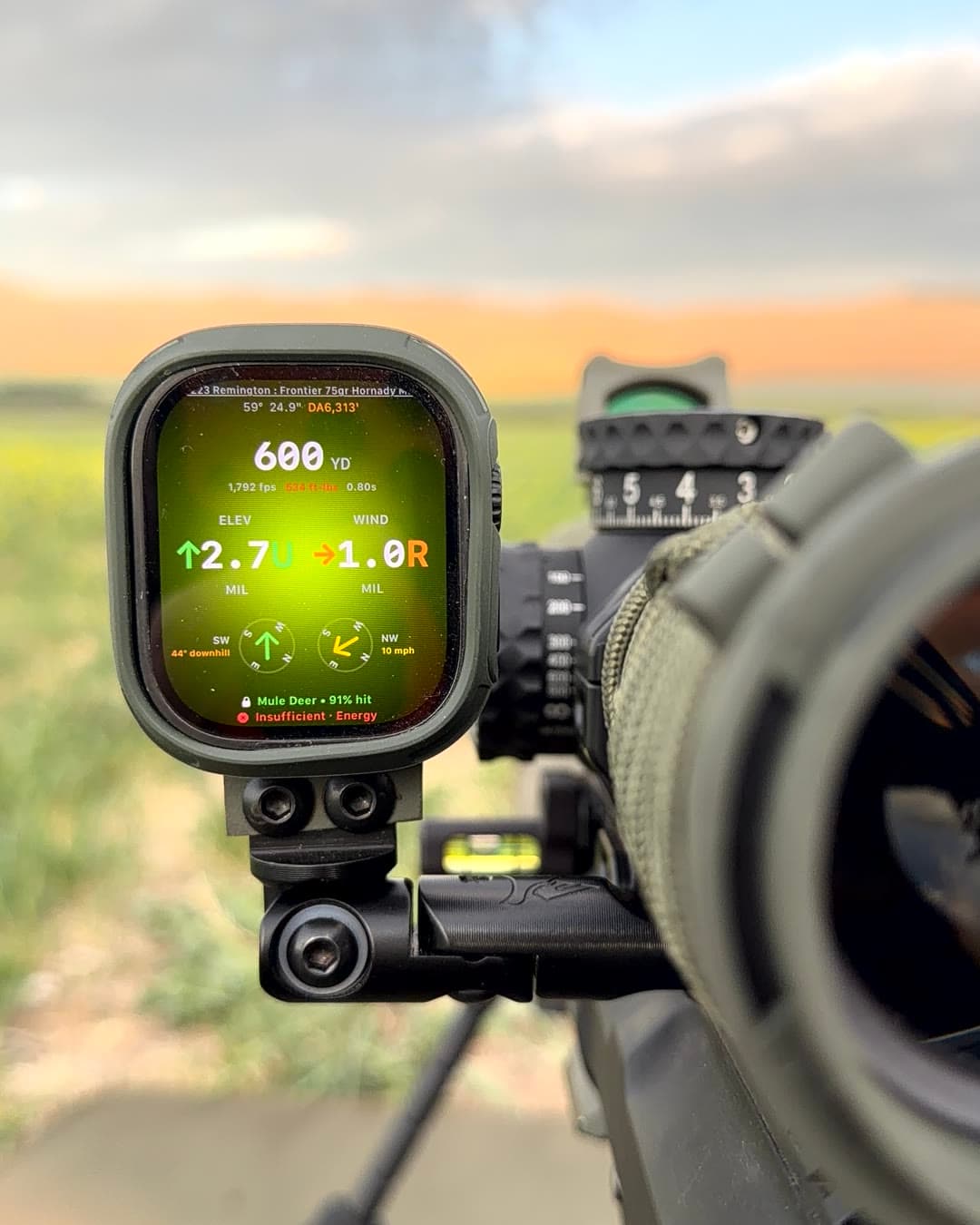AR-15 — rail mount — Watch on the handguard rail: live holds next to the optic.
